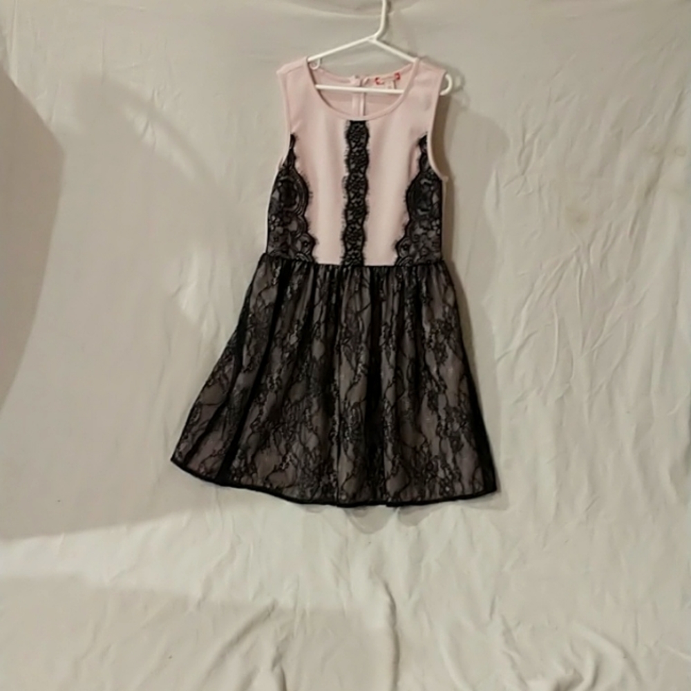 I am selling a Ruby and Bloom dress and the size is 12.